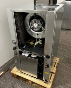 Internal components of an indoor air handler unit, showing the blower motor, serviced by Infinite Heating & Air in Newnan, GA.