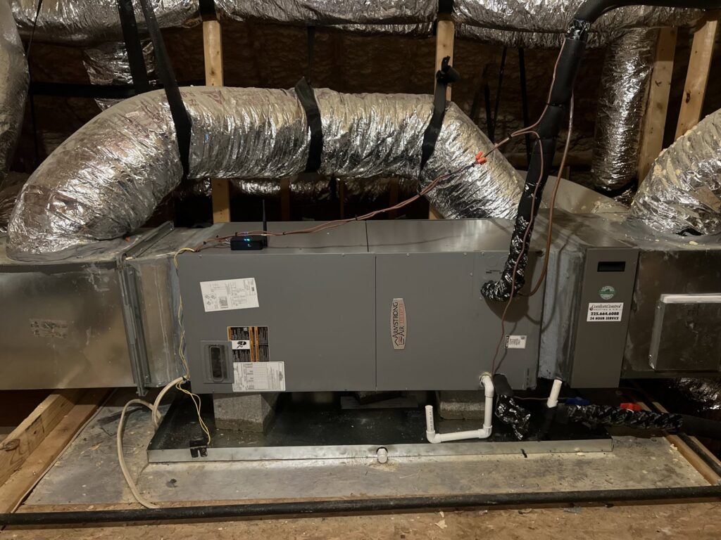 An Armstrong Air indoor air handler unit with ductwork installed by Comfort Zone AC and Heating Services LLC in Sunrise Beach, MO