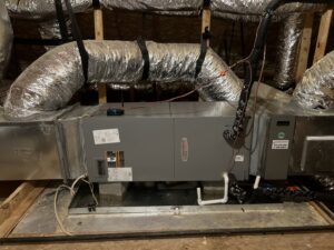 An Armstrong Air indoor air handler unit with ductwork installed by Comfort Zone AC and Heating Services LLC in Sunrise Beach, MO