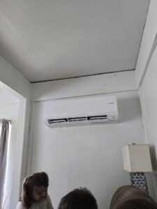 An indoor Bosch ductless mini-split unit installed on a wall in a room by Cummings Inc. in Puyallup, WA.