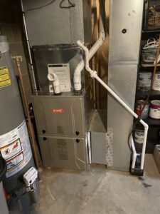 A Bryant indoor furnace and air handler unit with associated ductwork installed by Carpenter Mechanical in Columbus, OH.