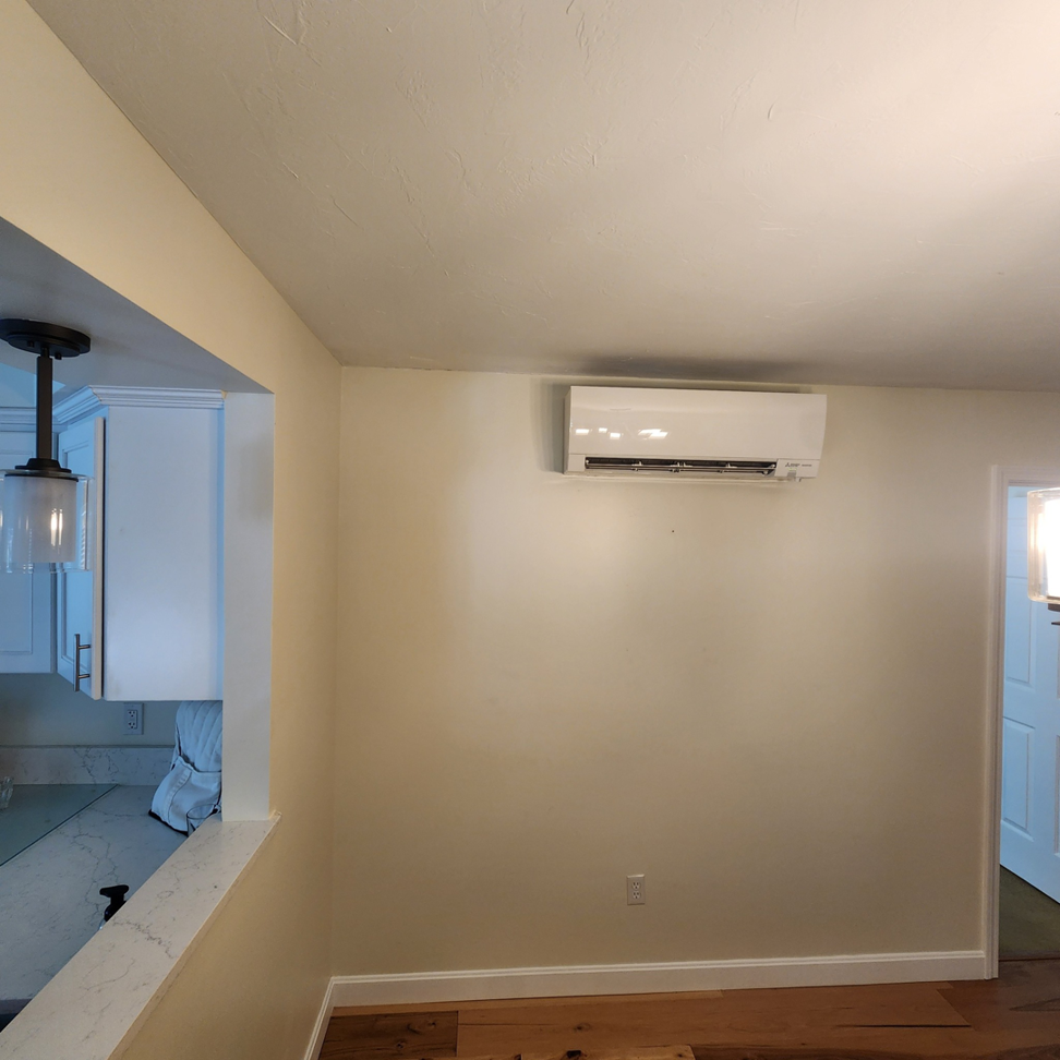 An indoor ductless mini-split heat pump unit installed in a room by Element Heat Pumps in Gray, ME.