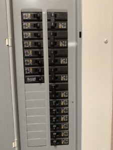 A close-up view of an indoor electrical breaker panel, a service provided by Minuteman Home Services in Mesa, AZ
