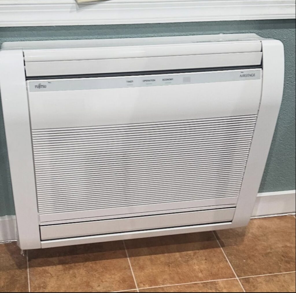 An indoor floor-standing mini-split HVAC unit installed by Alpine Pro Solutions in Allentown, PA.