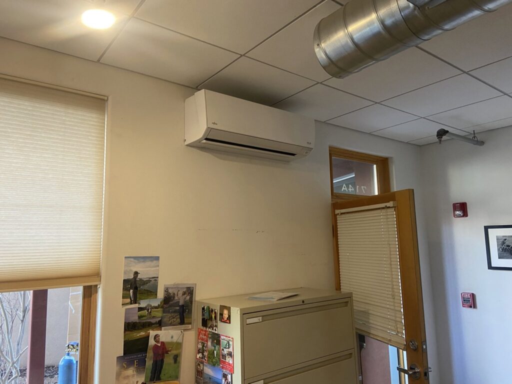 An indoor Fujitsu mini-split HVAC unit installed in an office setting by Santa Fe Heating & Cooling LLC in Santa Fe, NM.