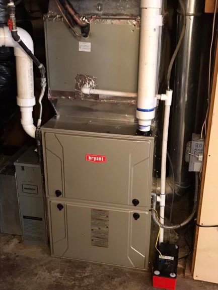 An indoor Bryant furnace or air handler with ductwork installed by DeHart Plumbing, Heating, & Air in Sparks, NV.