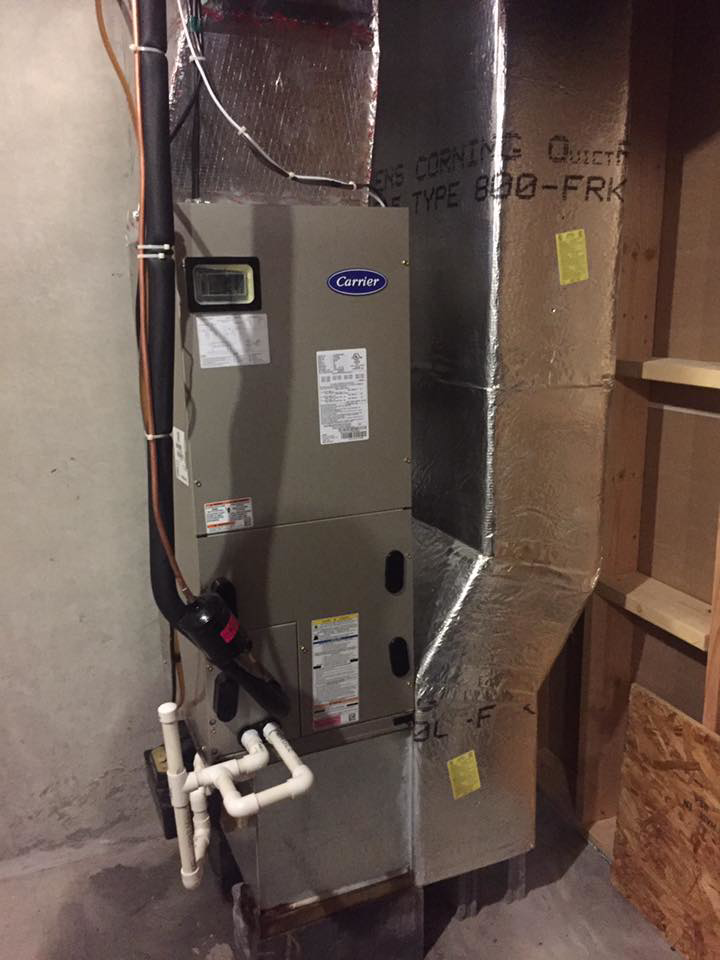An indoor furnace and air handler unit with ductwork, serviced by Hitz Heating Inc. in Harrisburg, PA.