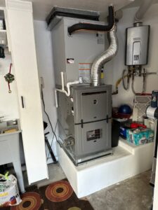 A newly installed indoor furnace and air handler unit by 32 Degrees Heating and Air Conditioning in Las Vegas, NV