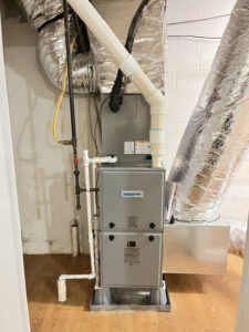 An indoor furnace and air handler unit installation by CHIN Flower HVAC LLC in Murfreesboro, TN.