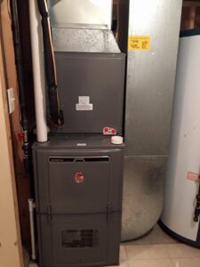 An indoor furnace and air handler unit with ductwork installed by Cool Tech Heating & Cooling in East Peoria, IL.