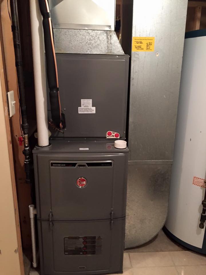 An indoor furnace and air handler unit with ductwork installed by Cool Tech Heating & Cooling in East Peoria, IL.