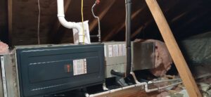 An indoor furnace and air handler unit installation with ductwork by Southern Oregon Heating & Air Conditioning in Medford, OR