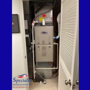 An indoor furnace and air handler unit installed by Specialty Heating and Cooling in Portland, OR.