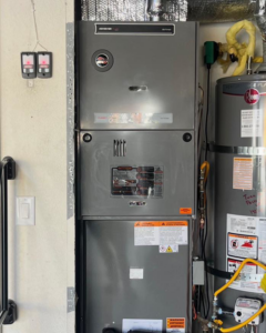 An indoor furnace and air handler unit installed by Paul's Heating & Air Conditioning in Virginia Beach, VA.