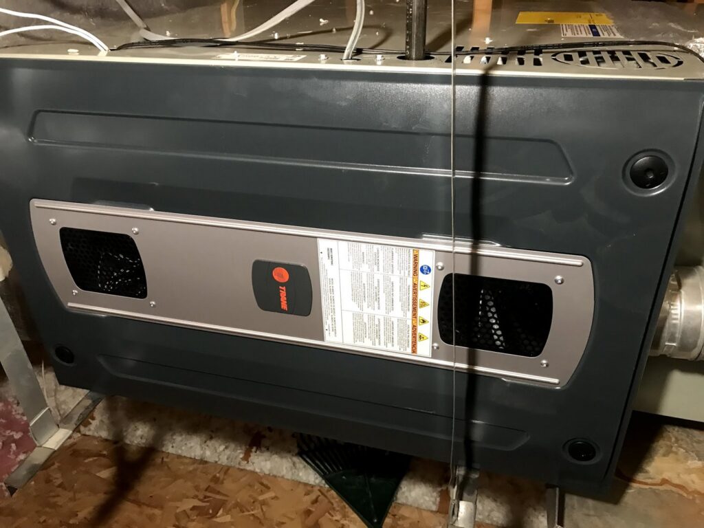 An indoor furnace or air handler unit installed by A+ Air and Aeroseal in Scottsdale, AZ.