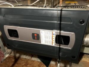 An indoor furnace or air handler unit installed by A+ Air and Aeroseal in Scottsdale, AZ.