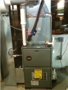 An indoor furnace and air handler unit installed by Accurate Conditioning in Sayreville, NJ.