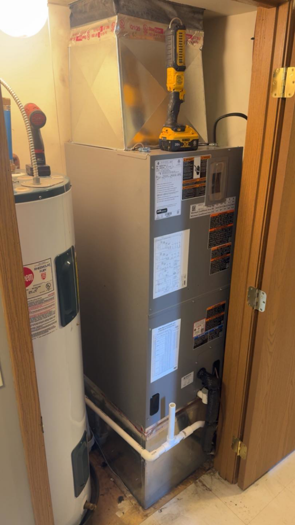 An indoor furnace and air handler unit with ductwork, serviced by Brown's Heating & Air Conditioning in Columbia, TN.