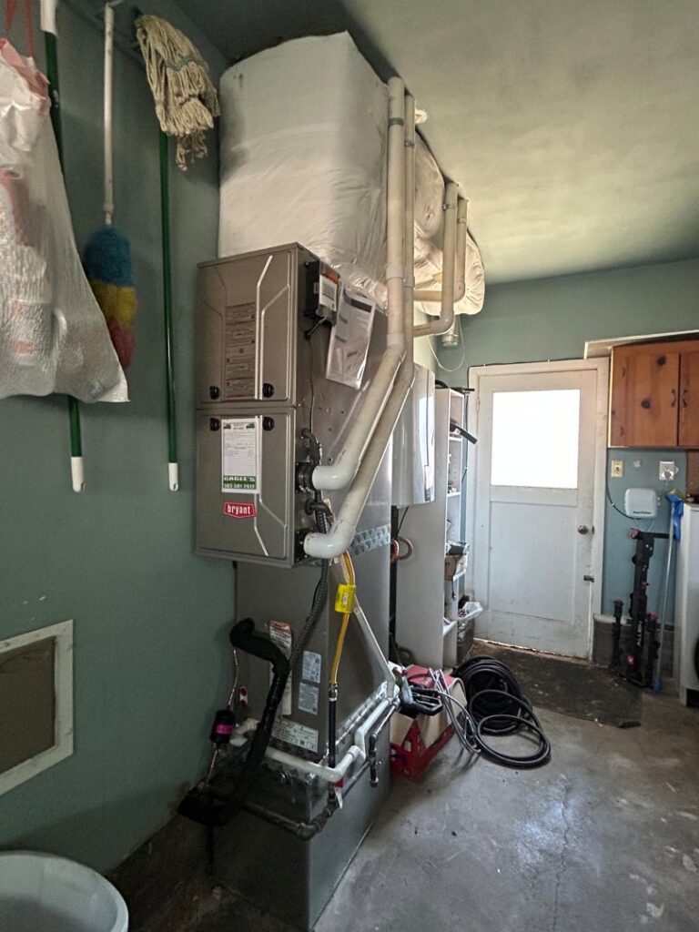 An indoor furnace and air handler unit installed by Gagles Heating in Salem, OR.