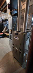 An indoor furnace and air handler unit installed by Pike Mechanical in Vevay, IN.