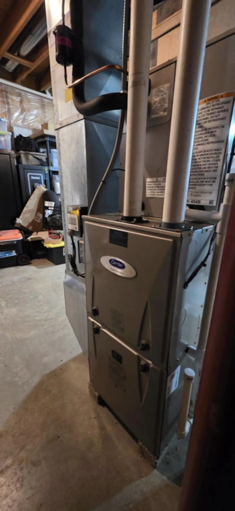 An indoor furnace and air handler unit installed by Pike Mechanical in Vevay, IN.
