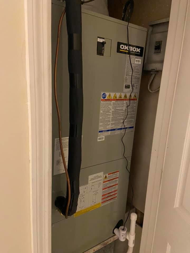 An indoor furnace or air handler unit installed by Turner & Son's Heating and Air in Anderson, IN