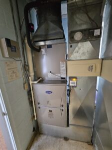An indoor furnace and associated ductwork installed by Pike Mechanical in Vevay, IN.