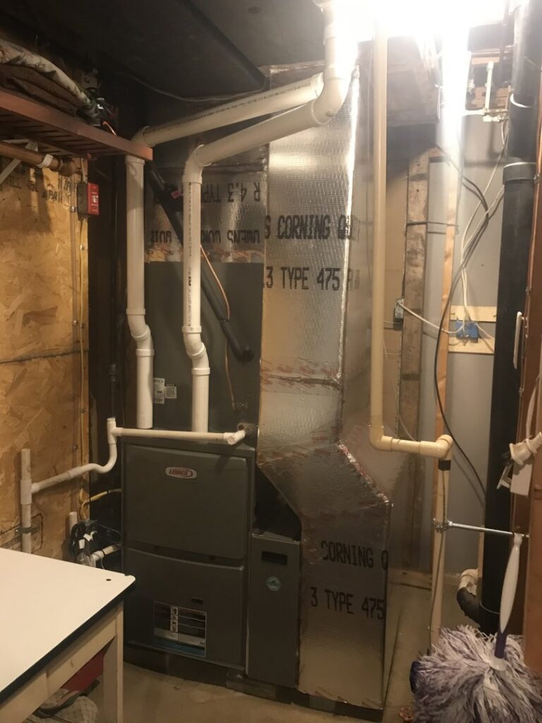 An indoor furnace system with extensive ductwork installed by Strine's Heating & A/C in York, PA.