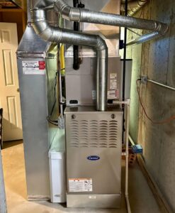 An indoor furnace and ductwork installed by A All Temp Inc. Heating & Cooling in Naperville, IL.