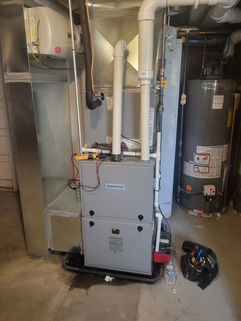 An indoor furnace and ductwork being serviced or installed by Brothers Heating & Cooling Inc. in Chicago, IL.