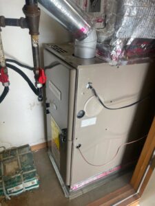 An indoor furnace unit, likely installed or serviced by One Way Heating And Cooling, LLC in Horizon City, TX.