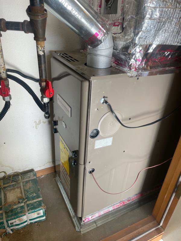 An indoor furnace unit, likely installed or serviced by One Way Heating And Cooling, LLC in Horizon City, TX.