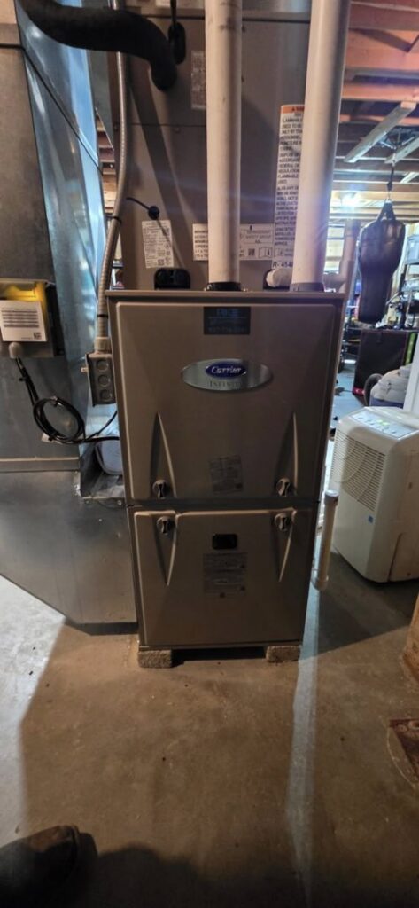 An indoor furnace unit installed by Pike Mechanical in Vevay, IN.