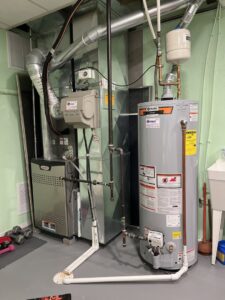 An indoor furnace and water heater installation completed by Davenport Service Company in Olathe, KS