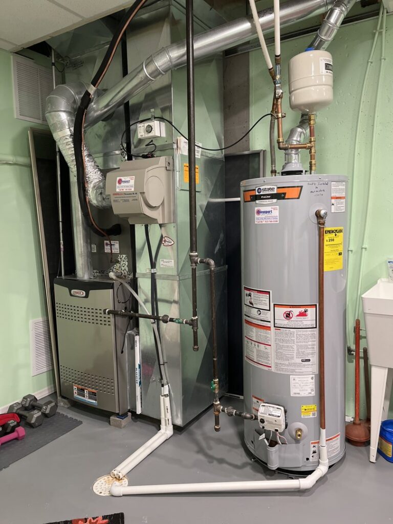 An indoor furnace and water heater installation completed by Davenport Service Company in Olathe, KS