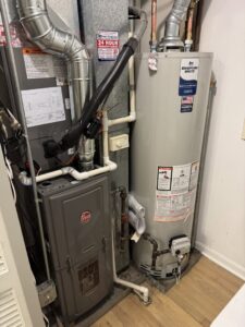 An indoor furnace and water heater installation by Etek Refrigeration Heating and Cooling, Inc. in Chicago, IL.