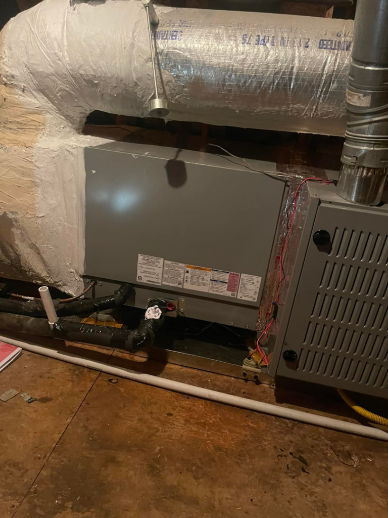 An indoor HVAC air handler and furnace unit with ductwork installed by Wicked Cool HVAC in Charleston, SC.
