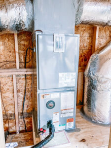 An indoor HVAC air handler unit installed with ductwork and wiring by A & A Air Conditioning & Heating in Little Rock, AR.
