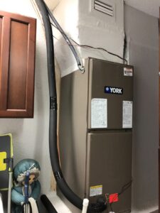 An indoor York HVAC air handler unit installed or serviced by Associated Piping Services in Orlando, FL.