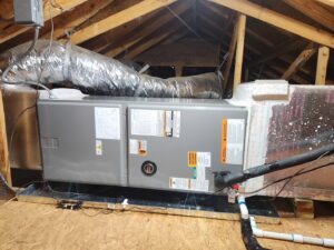 An indoor HVAC air handler unit and ductwork installed in an attic by Sterling Service of Florida Inc in Tallahassee, FL.