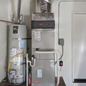 An indoor HVAC furnace and water heater installation by HVAC Service Austin, TX.