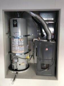 An indoor HVAC furnace and water heater system installed by Mechanical Express in Henderson, NV.