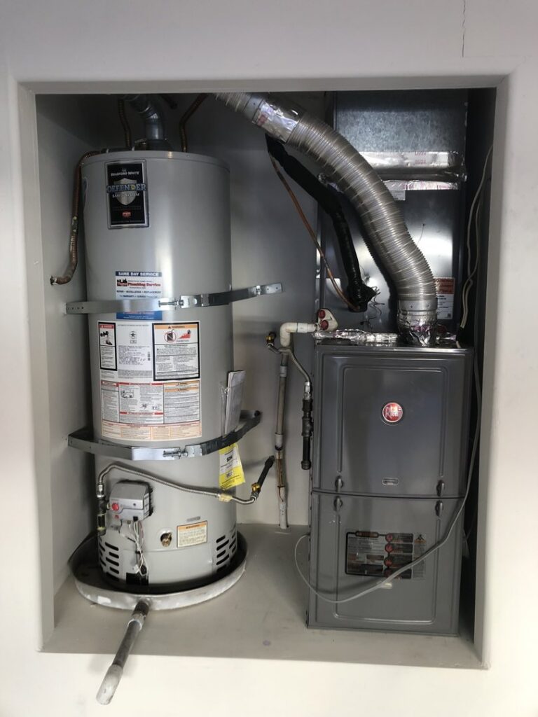 An indoor HVAC furnace and water heater system installed by Mechanical Express in Henderson, NV.
