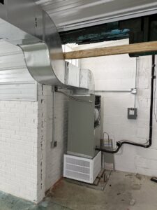 New indoor HVAC furnace and air handler unit installation by Infinite Comfort in Youngsville, NC.