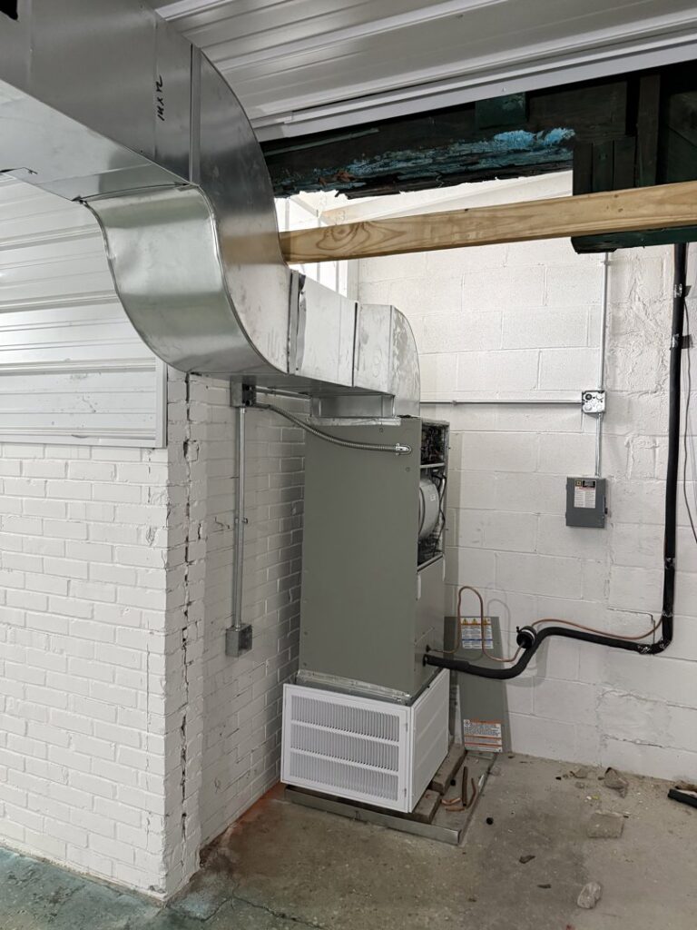 New indoor HVAC furnace and air handler unit installation by Infinite Comfort in Youngsville, NC.