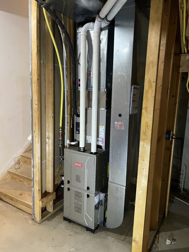 An indoor HVAC furnace and air handler unit installation by Synergy3, an HVAC contractor in Philadelphia, PA.