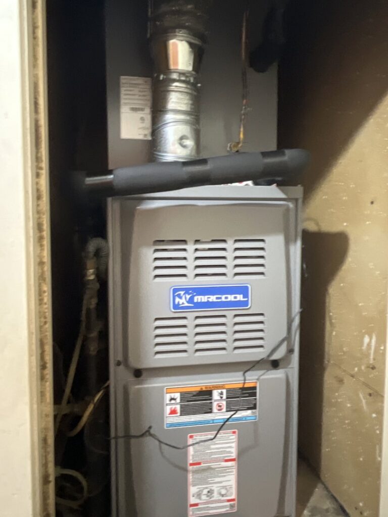 An indoor HVAC furnace unit installation by The Montz Company in Kentwood, LA