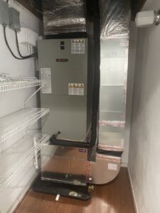 An indoor HVAC system installed in a utility closet by Brothers HVAC LLC in Owings Mills, MD