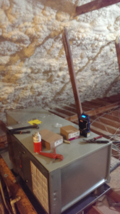 An indoor HVAC unit being installed or serviced in an attic by Moss Heating and Air in Greenville, SC