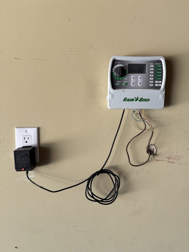 An indoor Rain Bird irrigation controller setup and wired by Steve Cavenee Electric in Orange, CA.